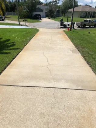 after image of a professional driveway cleaning
